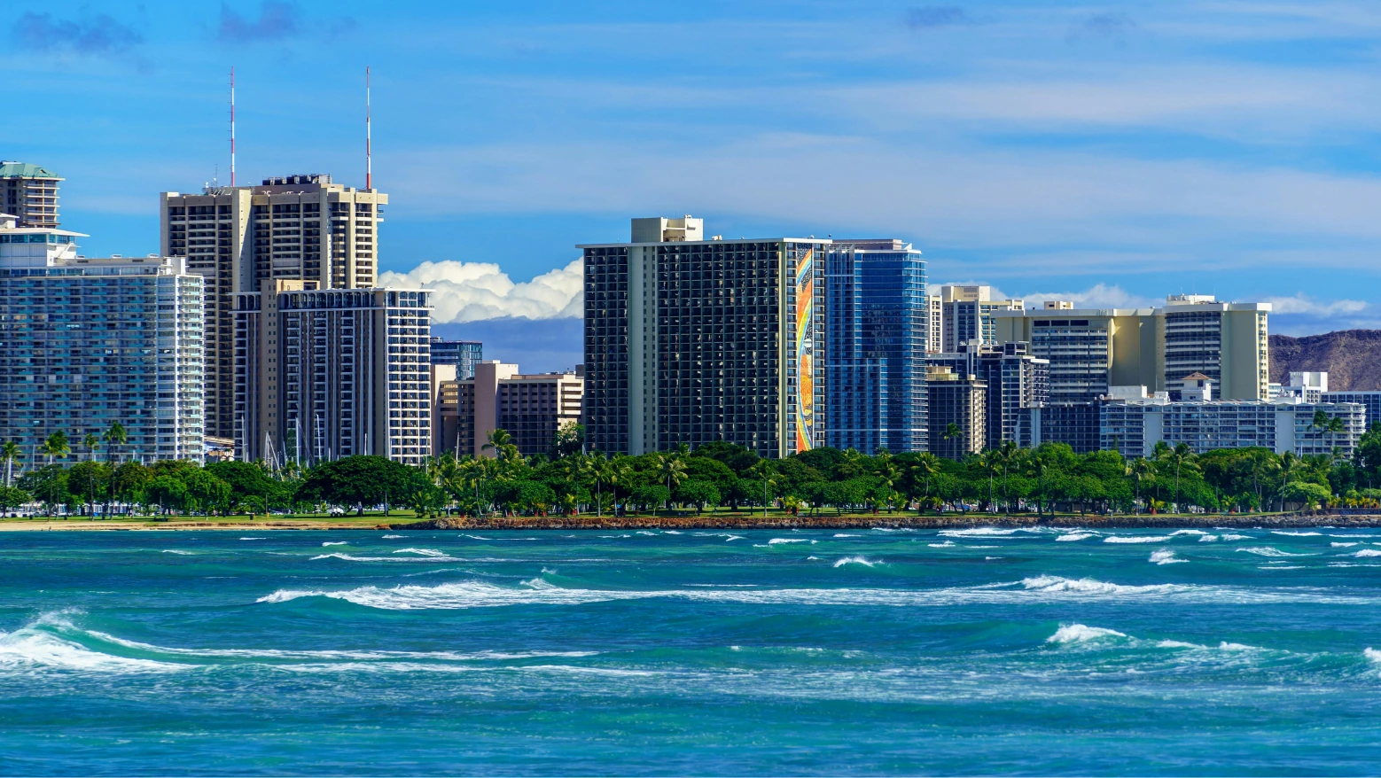 Hilton Hawaiian Village with Honolulu City Buildings and Ocean