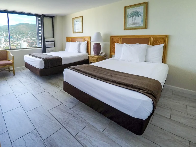 A photo of Waikiki Monarch Hotel showing the property and rooms.