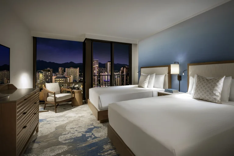 A photo of Halepuna Waikiki by Halekulani showing the property and rooms.