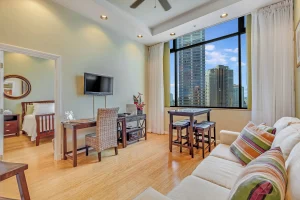 A photo of Castle at Palms at Waikīkī showing the property and rooms.