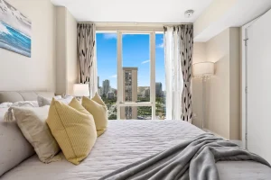 An image of the Allure Waikiki property and condo-style accommodations.