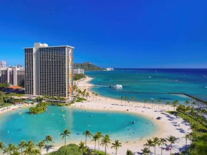 A photo of Hilton Hawaiian Village Waikiki Beach Resort showing the property and rooms.