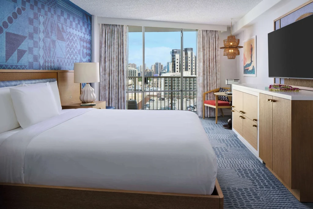 A photo of OUTRIGGER Waikiki Paradise Hotel showing the property and rooms.