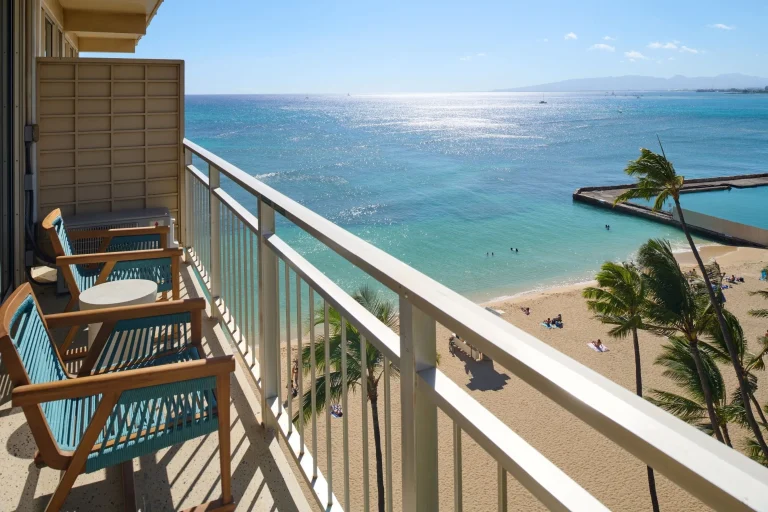 A photo of Kaimana Beach Hotel showing the property and rooms.