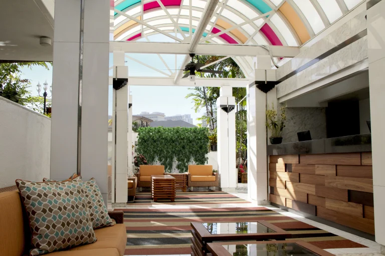 A photo of Oasis Hotel Waikiki showing the property and rooms.
