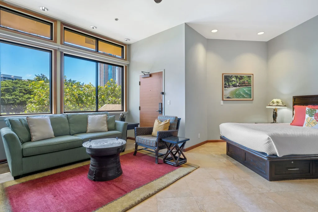 A photo of OUTRIGGER Waikiki Paradise Hotel showing the property and rooms.