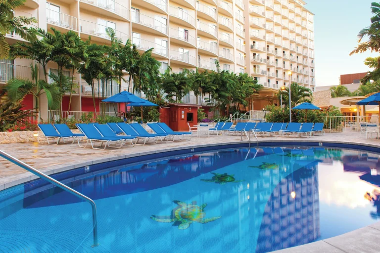 A photo of Club Wyndham at Waikiki Beach Walk showing the property and rooms.