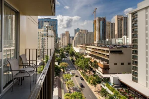 A photo of Hilton Garden Inn Waikiki Beach showing the property and rooms.