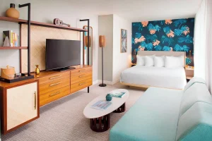 A photo of AC Hotel by Marriott Honolulu showing the property and rooms.