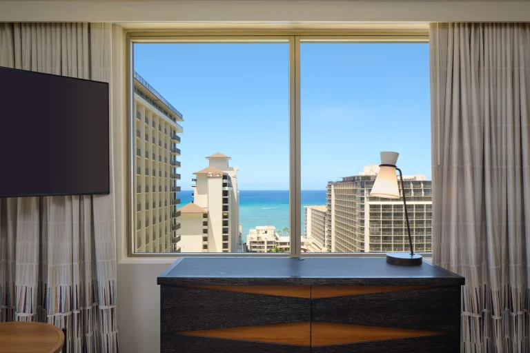 A photo of Embassy Suites by Hilton Waikiki Beach Walk showing the property and rooms.