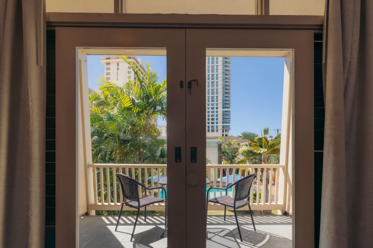 A photo of Waikiki Heritage Hotel showing the property and rooms.