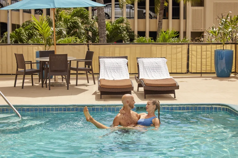 A photo of Waikiki Resort Hotel showing the property and rooms.
