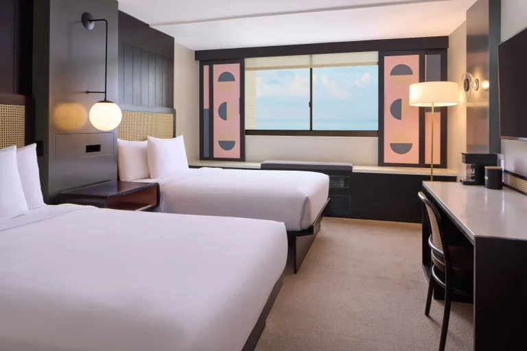 A photo of Waikiki Heritage Hotel showing the property and rooms.