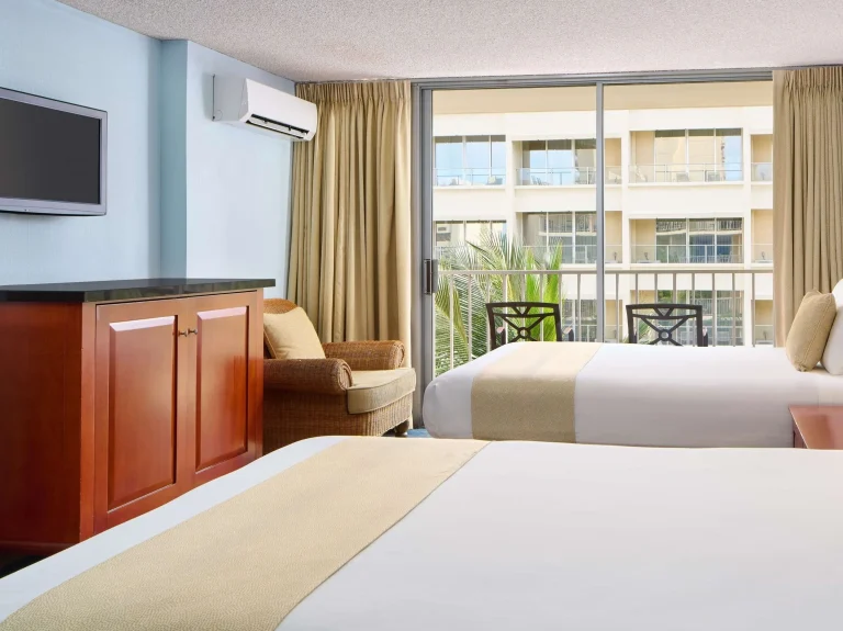 A photo of Ewa Hotel Waikiki showing the property and rooms.