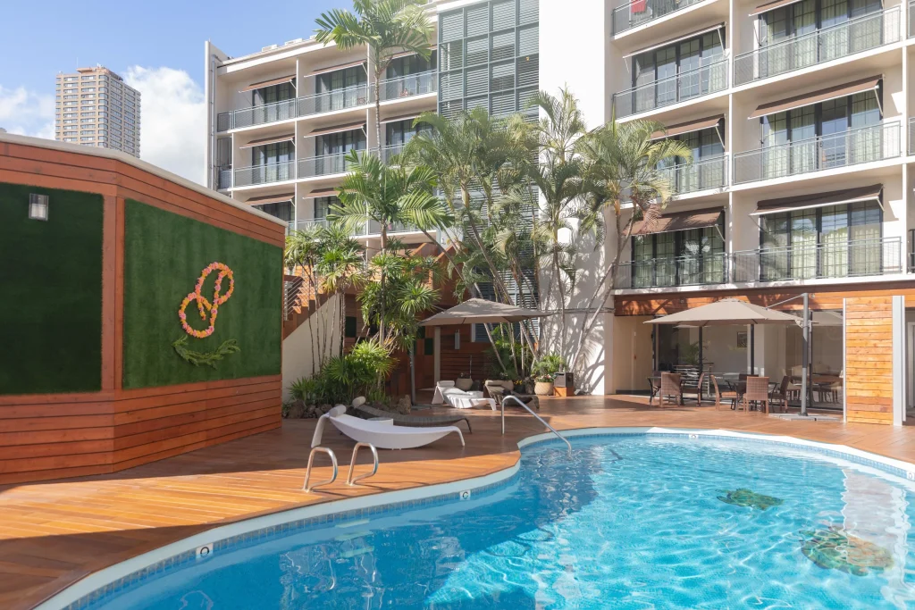 A photo of Courtyard by Marriott Waikiki Beach showing the property and rooms.
