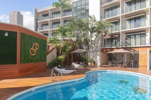 A photo of Courtyard by Marriott Waikiki Beach showing the property and rooms.