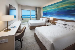 A photo of Sheraton Waikiki Beach Resort showing the property and rooms.