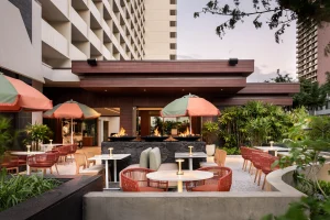 A photo of The Ambassador Hotel of Waikiki, Tapestry Collection by Hilton showing the property and rooms.