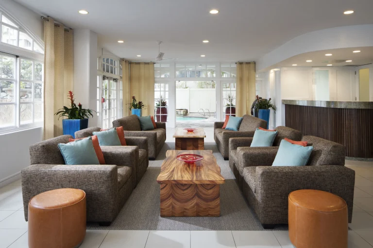 A photo of Coconut Waikiki Hotel showing the property and rooms.