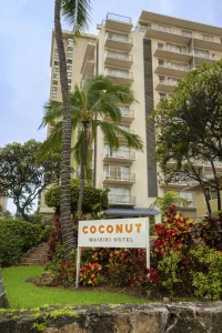 A photo of Coconut Waikiki Hotel showing the property and rooms.