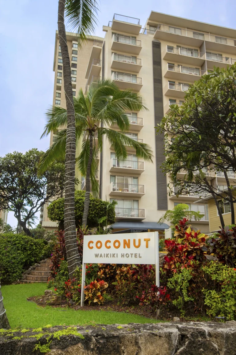 A photo of Coconut Waikiki Hotel showing the property and rooms.