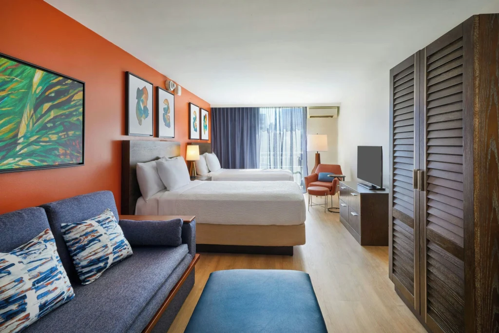 A photo of Courtyard by Marriott Waikiki Beach showing the property and rooms.