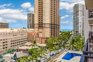 A photo of Castle at Palms at Waikīkī showing the property and rooms.