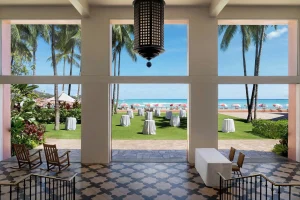 A photo of Queen Kapiolani Hotel showing the property and rooms.