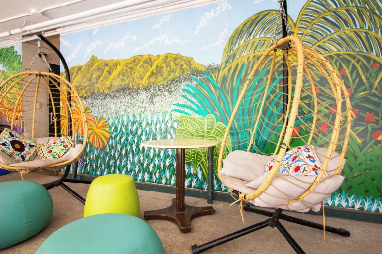 A photo of Waikiki Beachside Hostel showing the property and rooms.