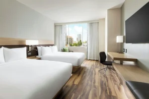 A photo of AC Hotel by Marriott Honolulu showing the property and rooms.