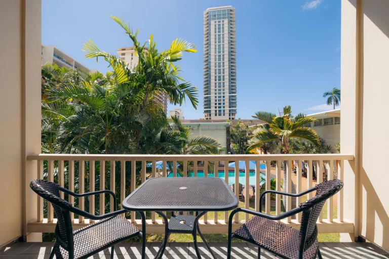 A photo of Waikiki Heritage Hotel showing the property and rooms.