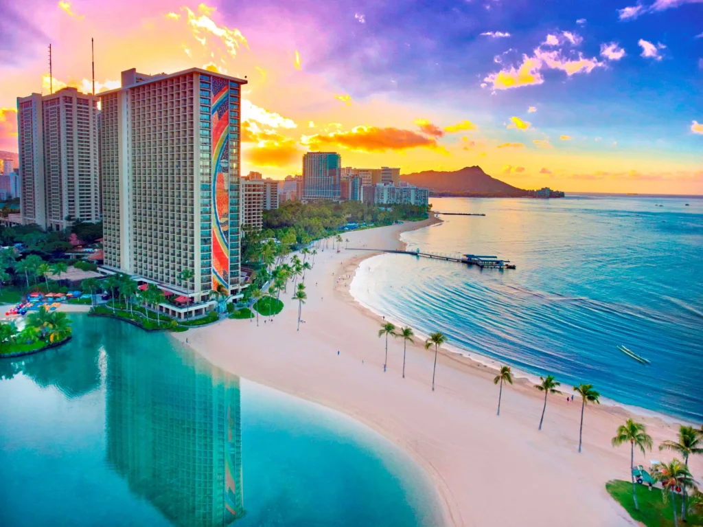 A photo of Hilton Hawaiian Village Waikiki Beach Resort showing the property and rooms.