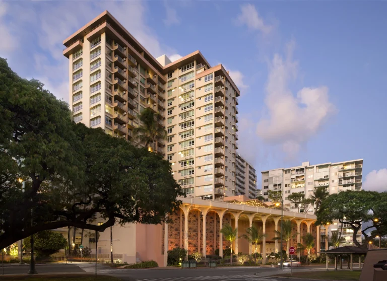 A photo of Queen Kapiolani Hotel showing the property and rooms.